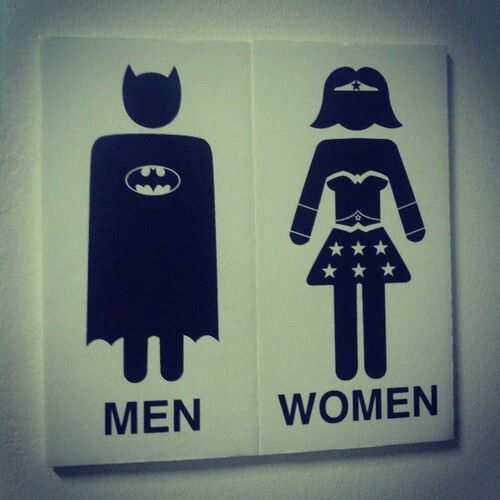 Superwoman and Batman - wonder what the inside of this bathroom ...