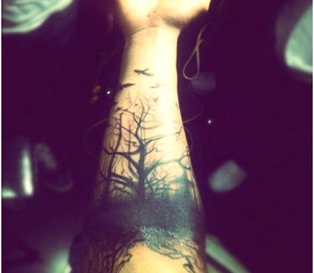 Spooky black tree with birds forearm tattoo - Tattooimages.biz