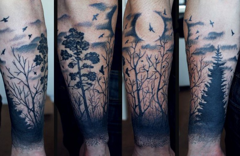 Black ink moon and black forest tattoo on arm - Tattooimages.biz