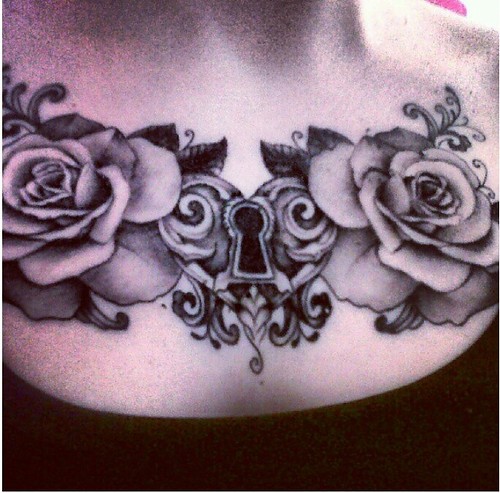 heart lock and roses upper chest tattoo. leave black and white or ...
