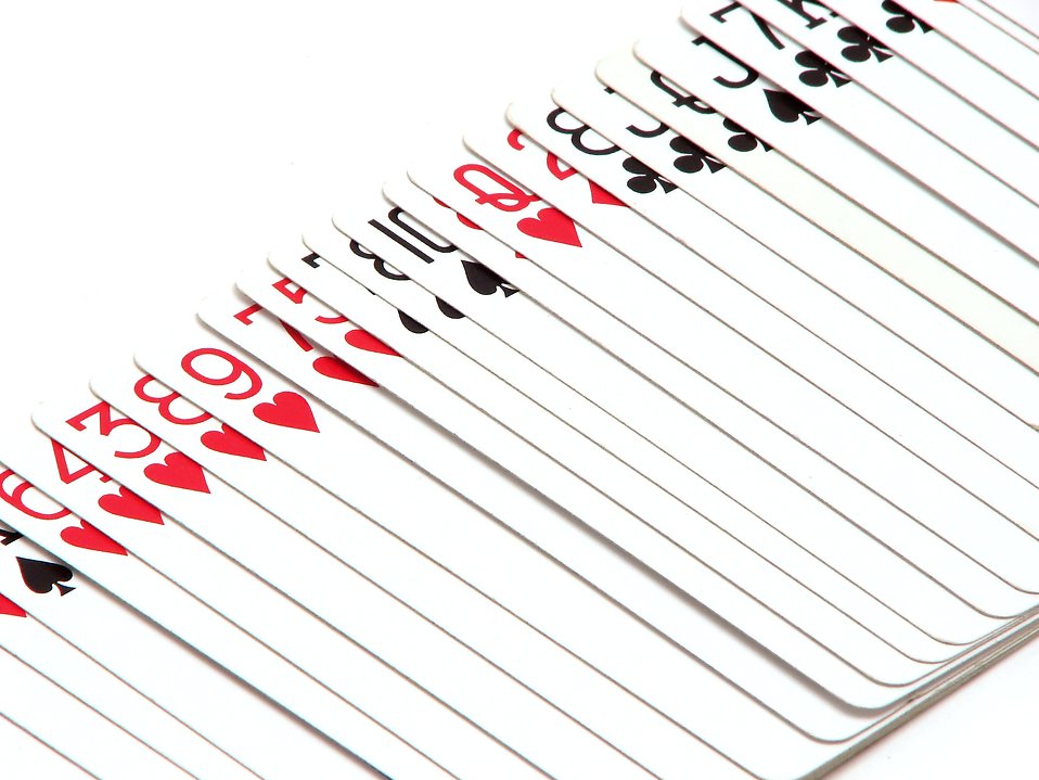 Free Stock Photos | Playing cards fanned out on a white background ...