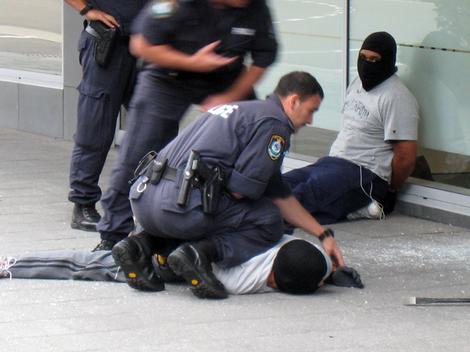 Freeze! Cops make a meal out of bank robbers - National - smh.com.au