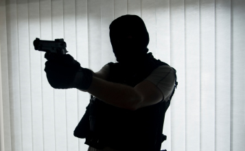 Armed robbers post notice of attack on walls in Kasoa