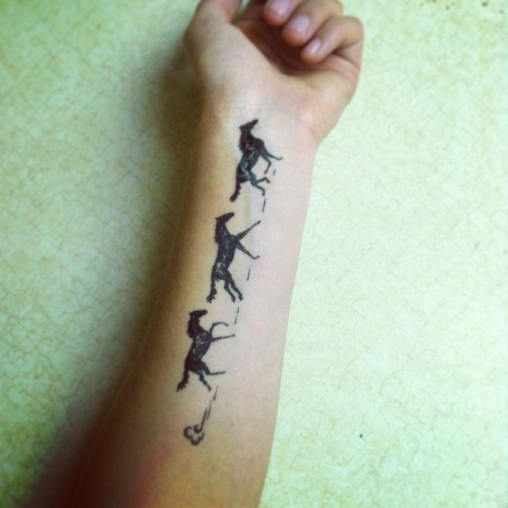 Running horses tattoo on hand - Tattooimages.biz