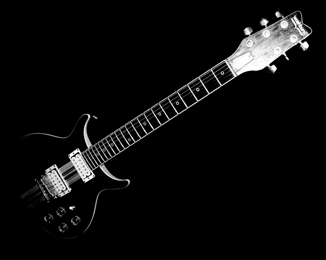 electric-guitar-in-black-and- ...