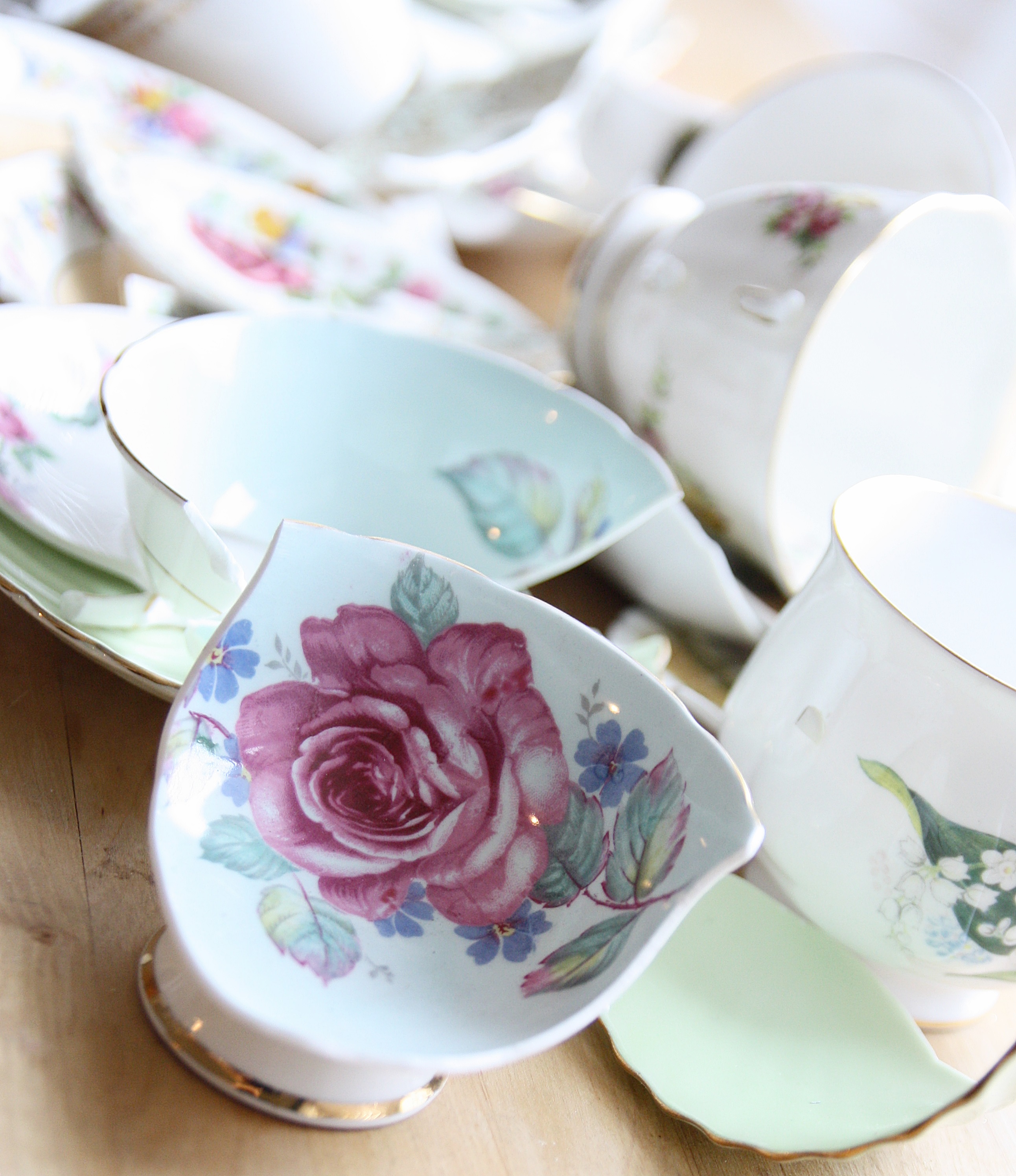 a box of broken tea cups |