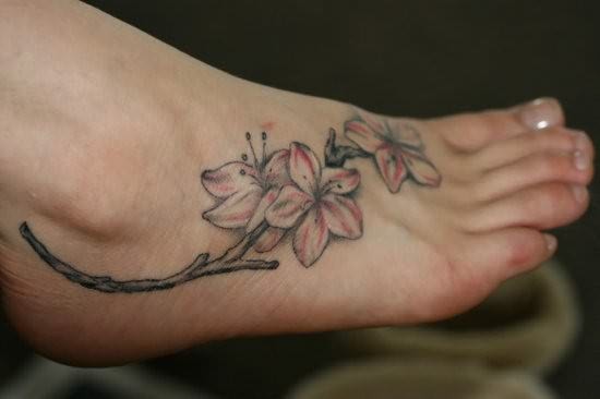 simple-flowers-tatoo-on-foot.jpg