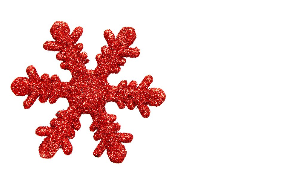 Free Stock Photos | A red snowflake shaped Christmas ornament ...