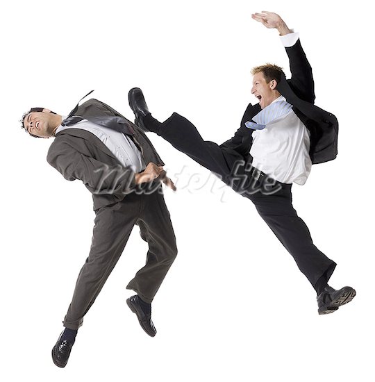 two businessmen fighting - Stock Photos
