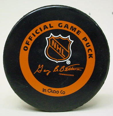 Professional HOCKEY PUCKS for sale from Gasoline Alley Antiques