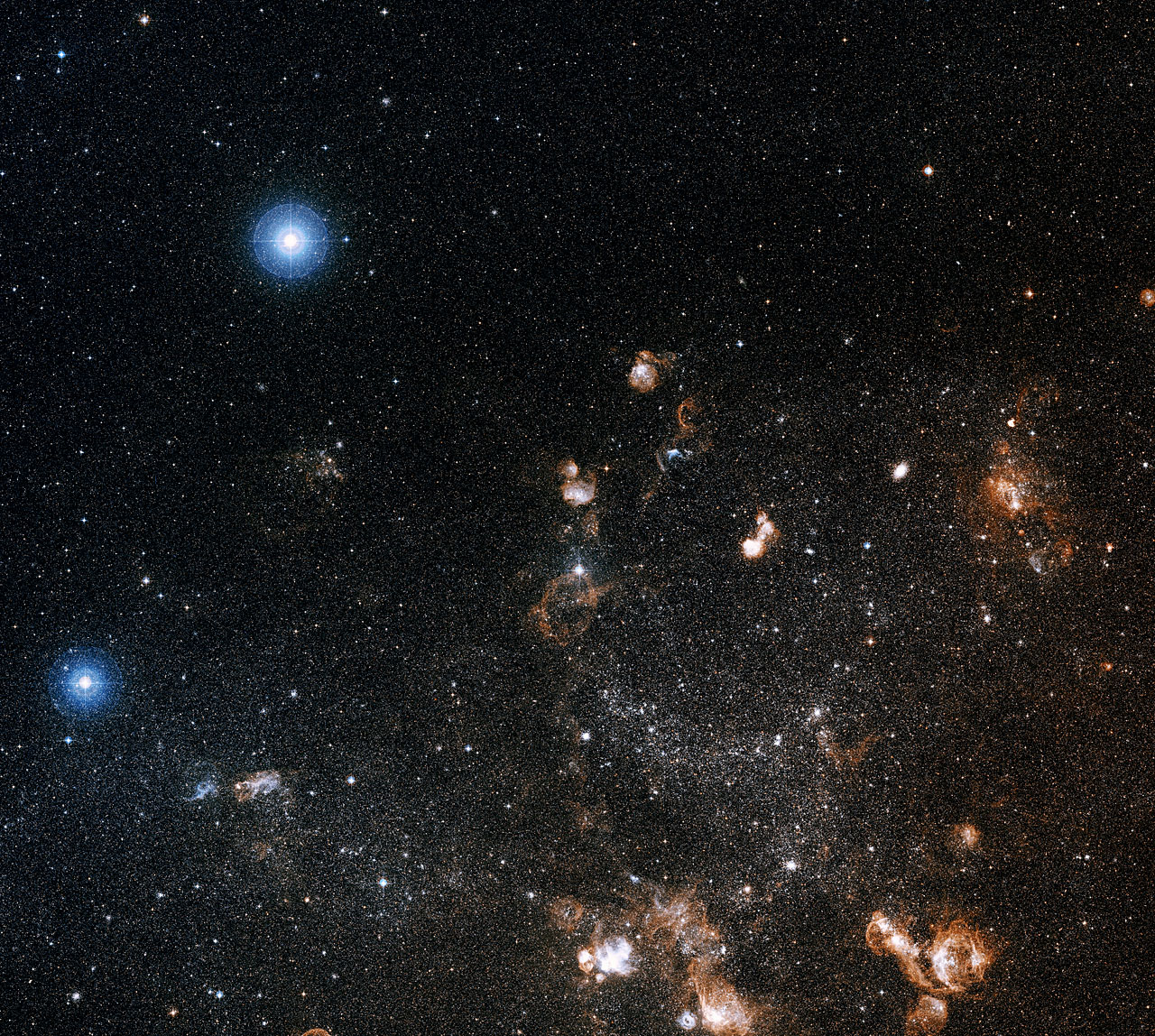 Large and small stars in harmonious coexistence | ESA/Hubble
