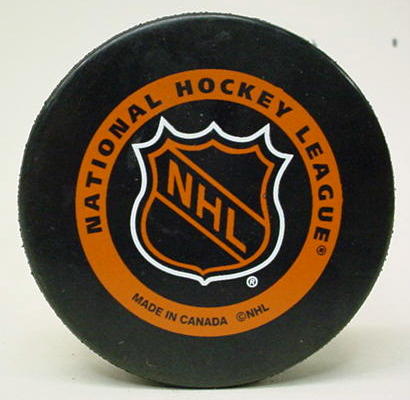 Professional HOCKEY PUCKS for sale from Gasoline Alley Antiques