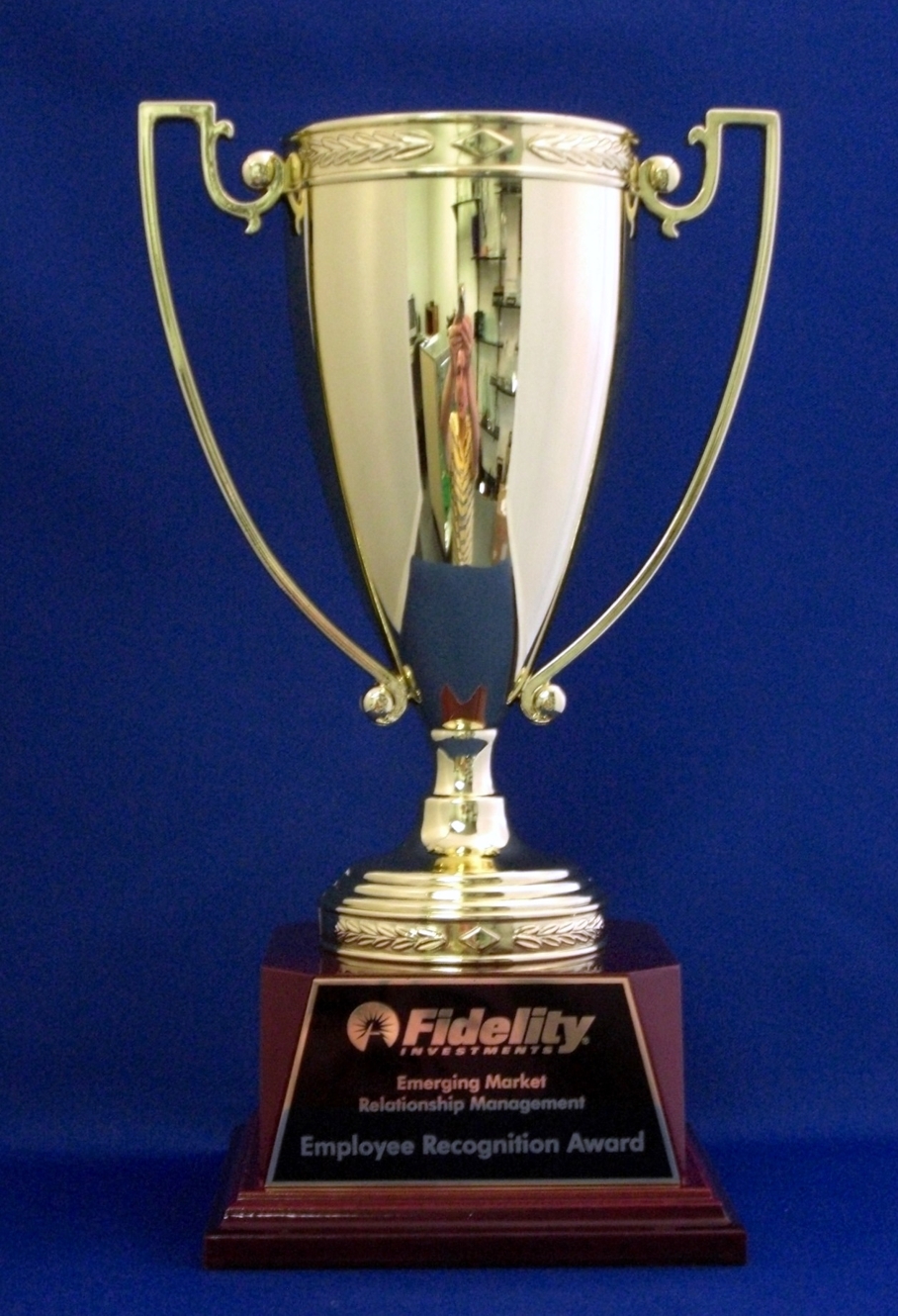 Personalized trophy cup with engraved logo and text details at NO ...